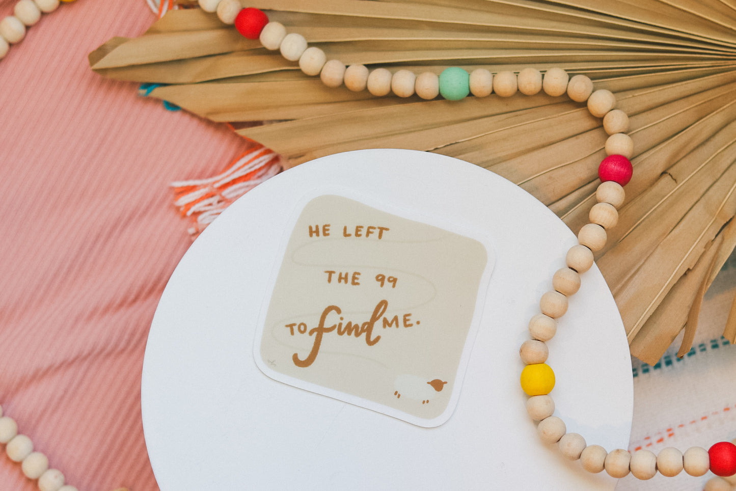 'He left the 99 to find me' handlettered sticker