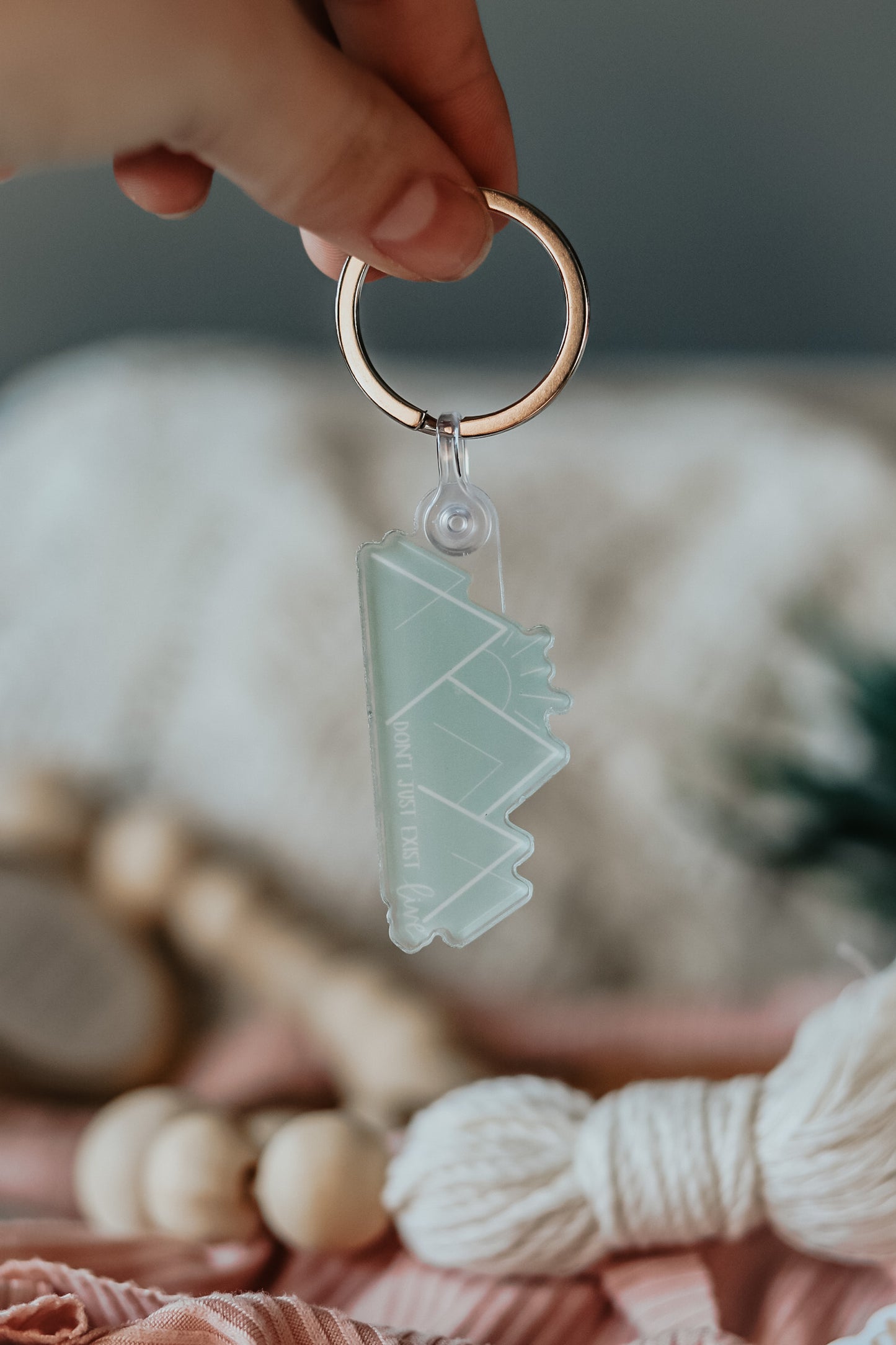 "Don't just exist, live" acrylic keychain