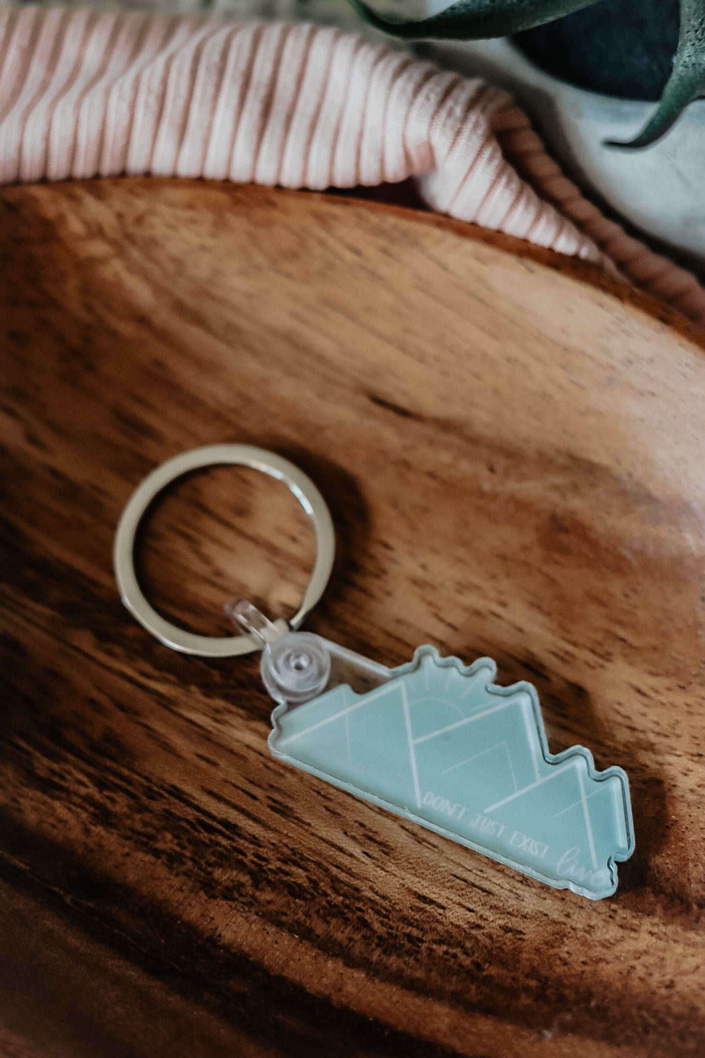 "Don't just exist, live" acrylic keychain
