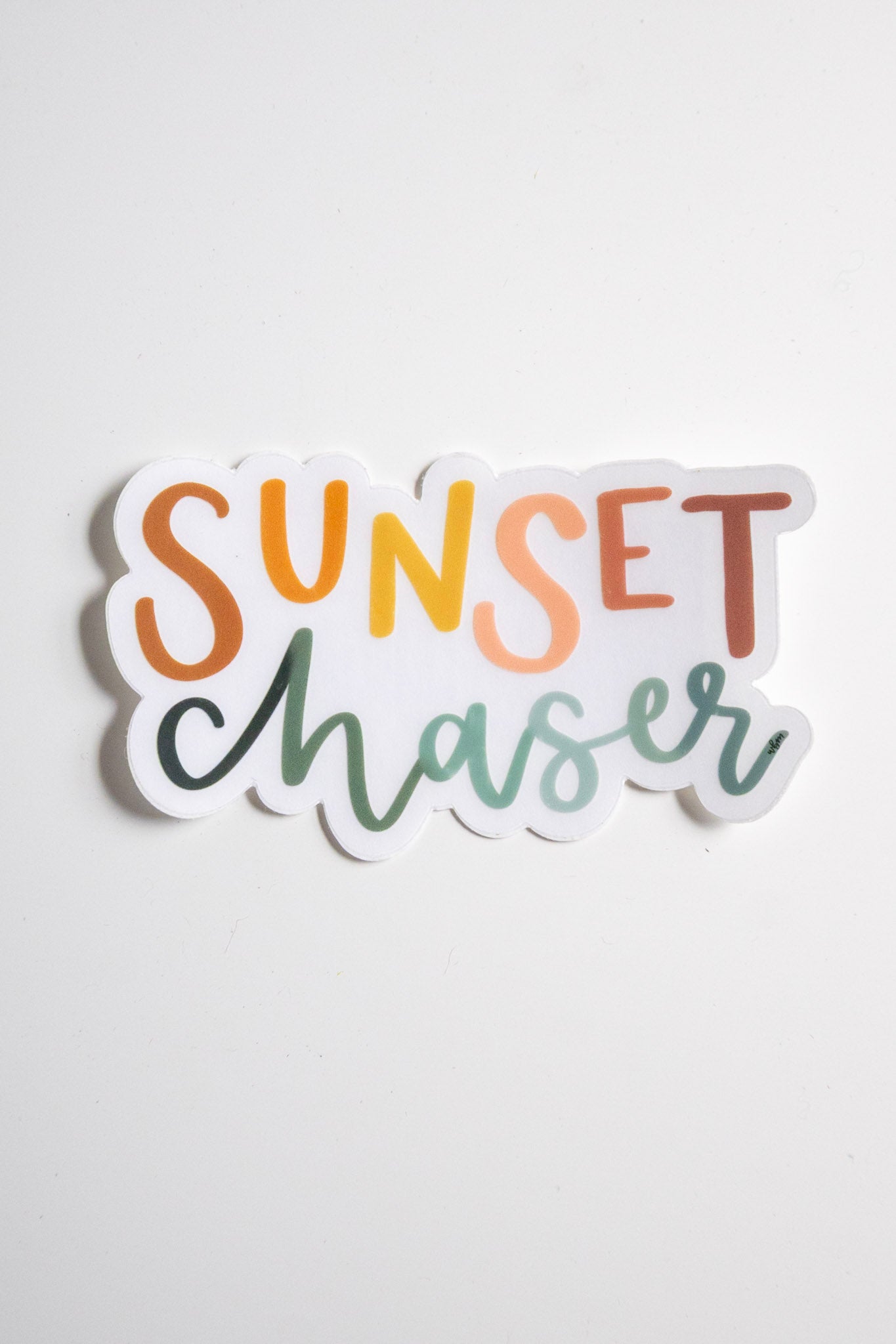 "Sunset Chaser' handlettered clear sticker