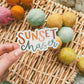 "Sunset Chaser' handlettered clear sticker