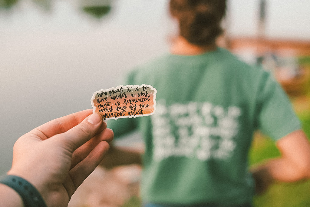 ‘How great it is to live under a sky....' handlettered sticker