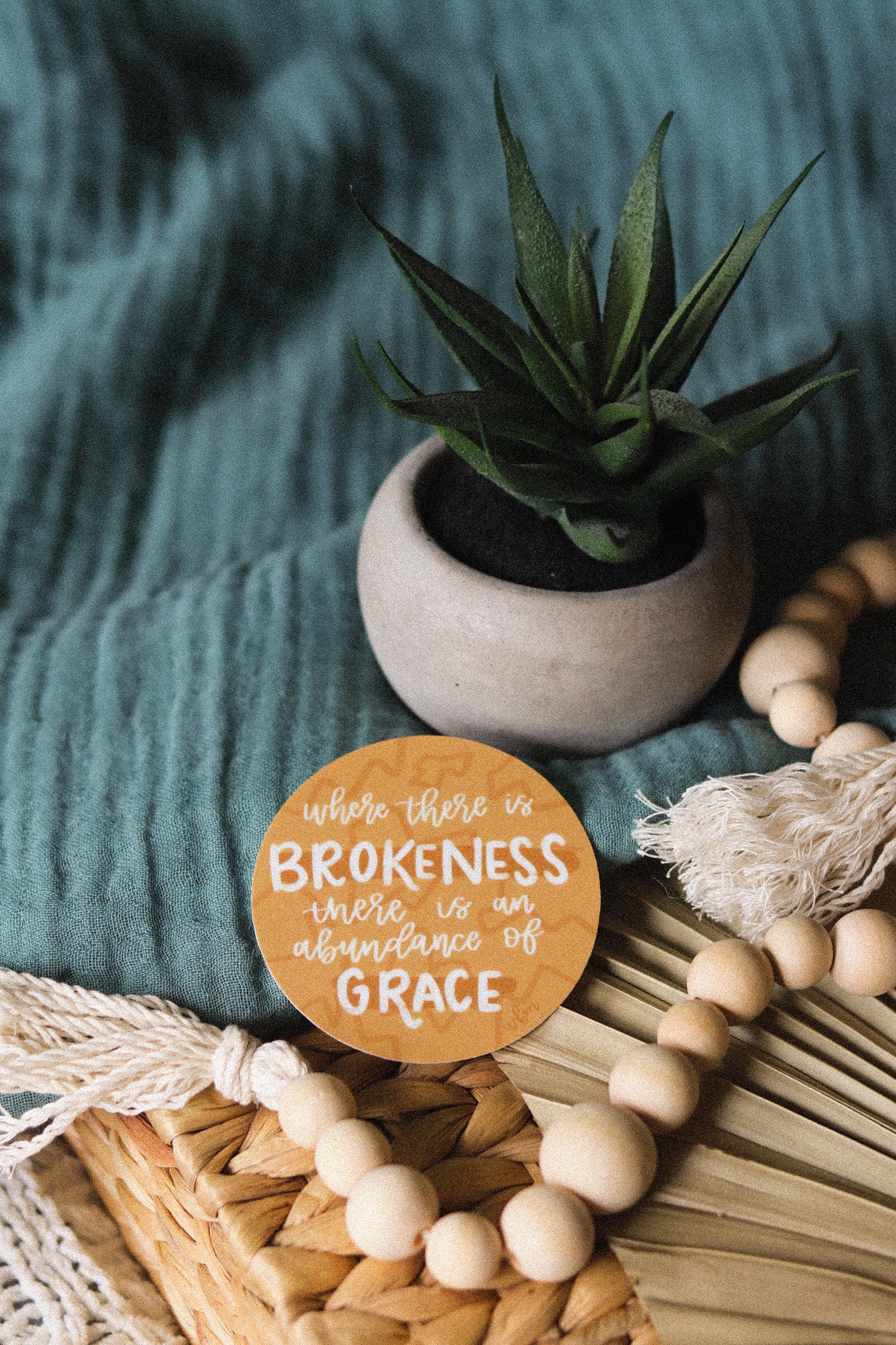 ‘Where there is brokeness, there is abundance of grace’ handlettered sticker
