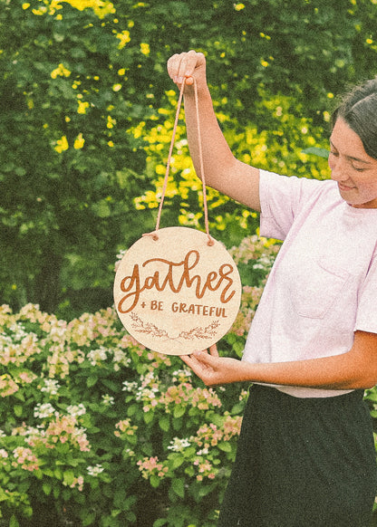 Laser engraved hanging wood sign with leather straps