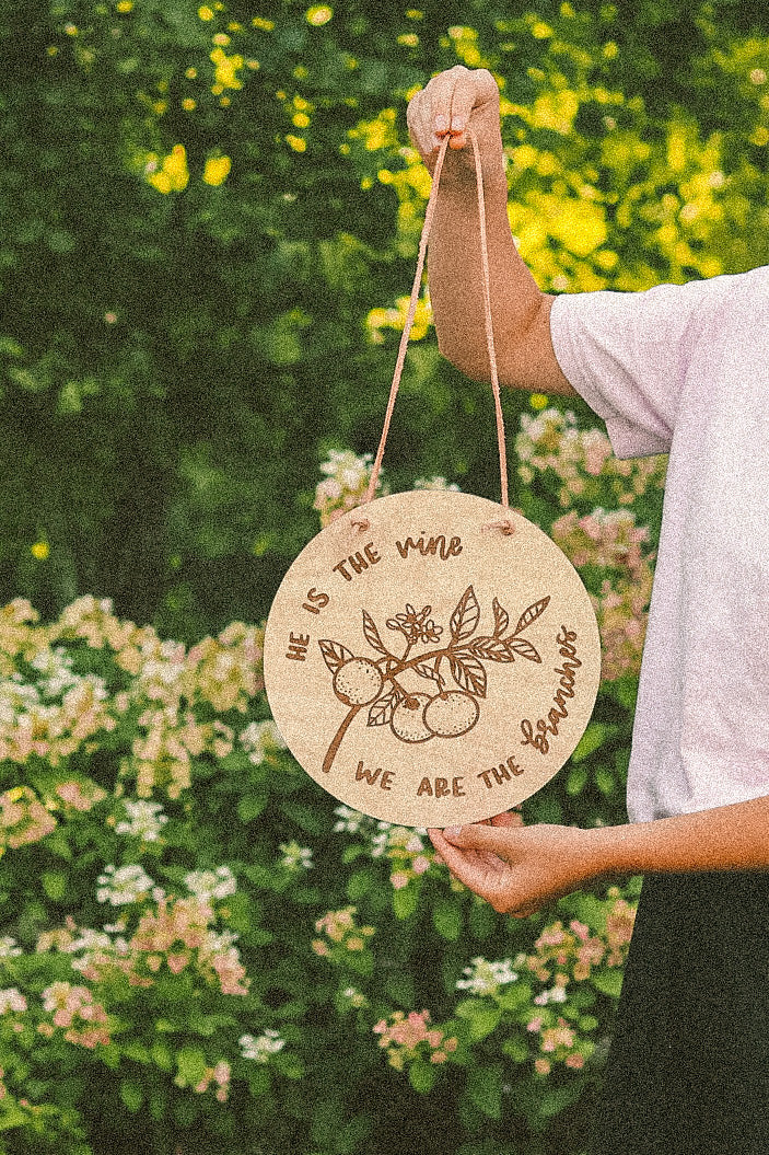 Laser engraved hanging wood sign with leather straps